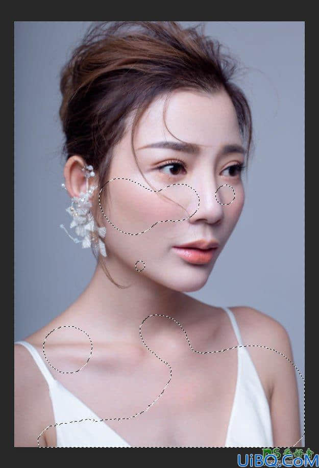 Photoshop人物美白磨皮教程：学习用磨皮及润色技术给美女人物进行美白。