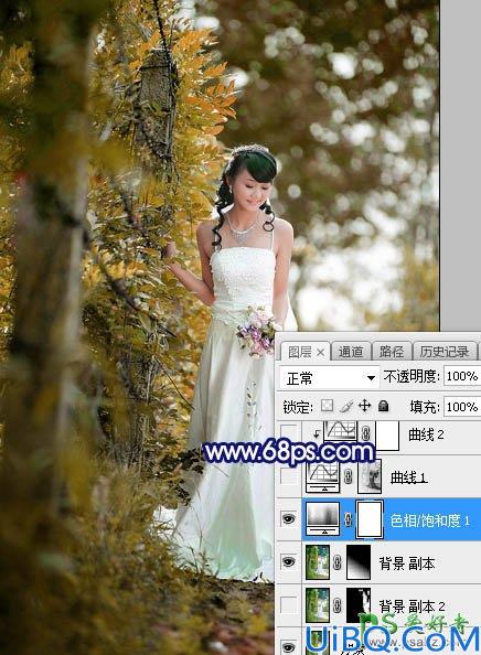 Photoshop调出蓝黄色秋季树林中漂亮的美女婚纱艺术照片