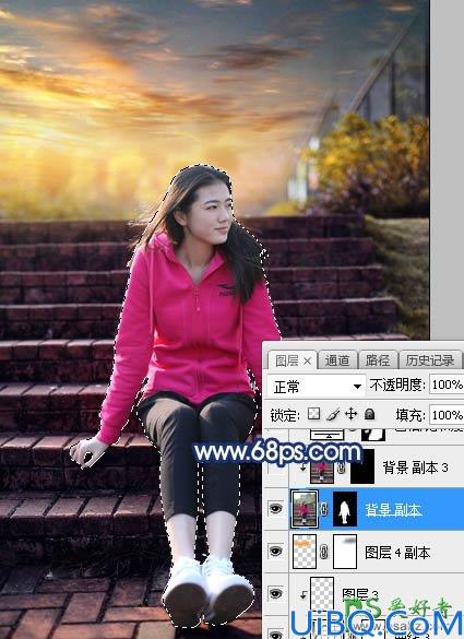 Photoshop给古建筑边自拍的红色运动装青春少女写真图片调出霞光