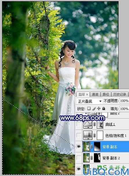 Photoshop调出蓝黄色秋季树林中漂亮的美女婚纱艺术照片