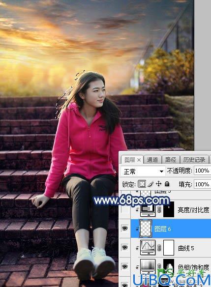 Photoshop给古建筑边自拍的红色运动装青春少女写真图片调出霞光