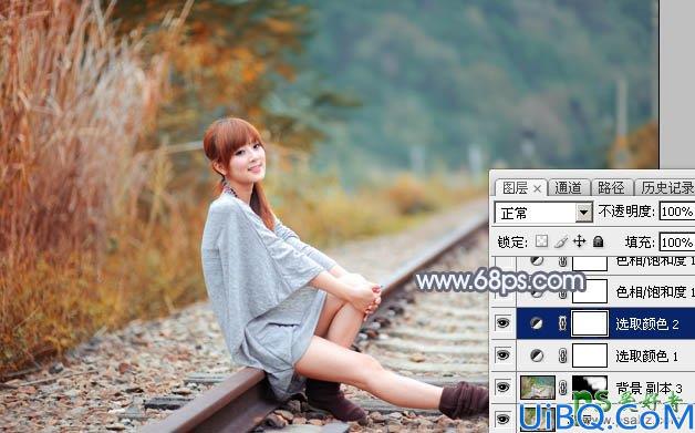 Photoshop调色教程：学习给外景铁路上自拍的美女艺术照调出秋季淡冷色