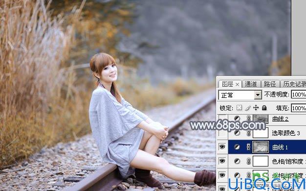 Photoshop调色教程：学习给外景铁路上自拍的美女艺术照调出秋季淡冷色