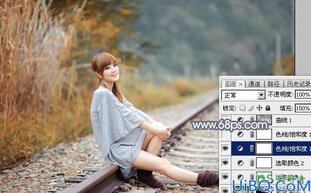 Photoshop调色教程：学习给外景铁路上自拍的美女艺术照调出秋季淡冷色