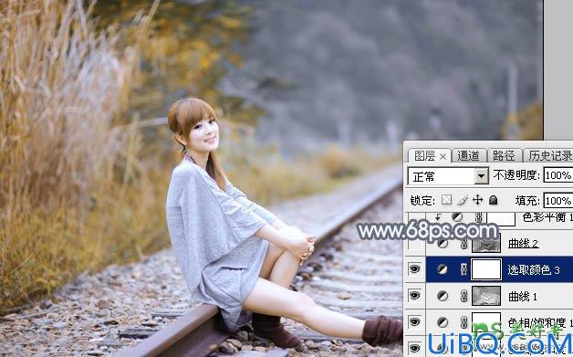 Photoshop调色教程：学习给外景铁路上自拍的美女艺术照调出秋季淡冷色