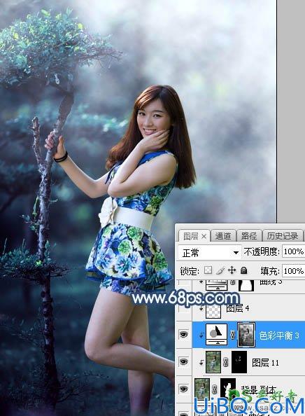 Photoshop调色教程：给树林中的性感美女老师写真照调出唯美的夏季青蓝色