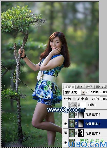 Photoshop美女图片调色：给小树林中的修长美腿美女生活照调出梦幻的蓝色