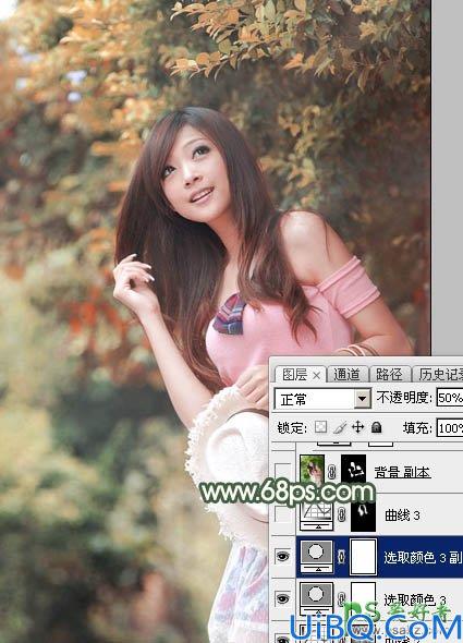 PhotoShop给绿色树林中自拍的女生照片调出唯美的秋季红褐色