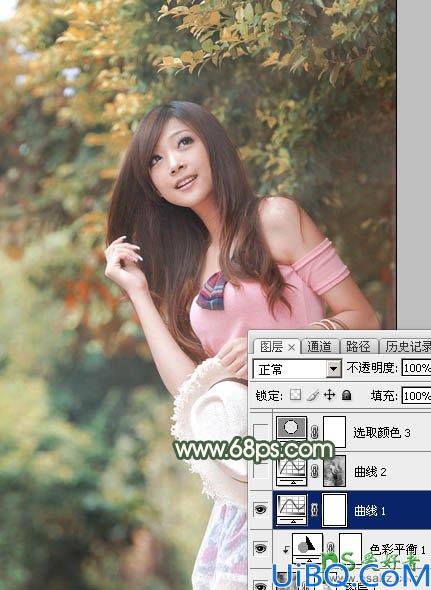 PhotoShop给绿色树林中自拍的女生照片调出唯美的秋季红褐色