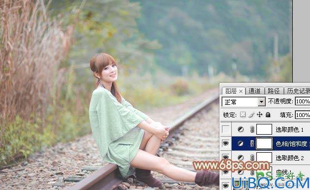 Photoshop图片调色实例教程:给铁轨上自拍的甜美女孩儿调出青绿色